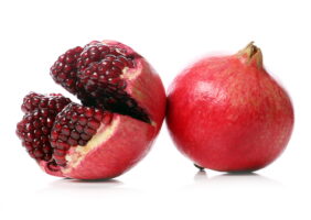 exotic-delicious-pomegranate-white-background